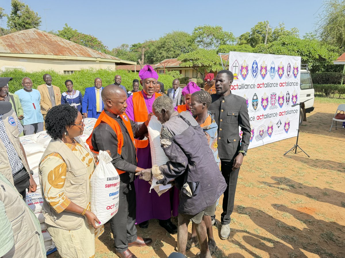 SadiikiAdams's tweet photo. Archbishop Kaziimba Flags Off Food Relief Distribution in Karamoja

KOTIDO, 18th August 2026 — The Archbishop of the Church of Uganda, The Most Rev Dr Stephen Samuel Kaziimba Mugalu, has this morning flagged off an emergency food relief distribution exercise in North Karamoja Diocese as the Church intensifies its response to the prolonged hunger crisis affecting communities in the Karamoja Sub-region.

The intervention follows a request by the Bishop of North Karamoja Diocese, the Rt Rev Simon Akol Aisu, to the Church of Uganda Board of Trustees during its meeting at Nabugabo Holiday Centre in Masaka in July. North Karamoja Diocese covers Kotido, Kaabong, Abim and Karenga districts.

Following the appeal, Church of Uganda mobilised support from ACT Alliance, Dioceses, institutions, Christians and other partners to provide emergency food assistance to vulnerable households.

The consignment flagged off includes 45,775 kgs of posho, 45,775 kgs of beans, 800kg of soya beans and 400kg of silver fish, with the soya beans and silver fish specifically intended to support malnourished children. The intervention is targeting more than 2,000 beneficiaries affected by food insecurity.

Speaking during the flag-off, @Archbp_COU said the prolonged hunger crisis has caused severe hardship among families in Karamoja, with children particularly exposed to the risk of malnutrition. 

“As a @ChurchofUganda_ , we cannot remain indifferent. We are here today because we believe that Christian compassion must be translated into direct, decisive action,” Archbishop Kaziimba said.

He commended ACT Alliance and the participating Church of Uganda Dioceses of Mukono, Kampala, Kigezi, West Buganda, Namirembe, Muhabura, Central Busoga and Soroti, as well as other institutions, partners and Christians who contributed towards the response. 

Speaking on behalf of @ACTAlliance , Country Coordinator Irene Anena reaffirmed the Alliance's commitment to working with the Church and other partners to respond to the humanitarian needs of vulnerable communities. 

She underscored the importance of coordinated humanitarian action in addressing immediate food needs while strengthening the resilience of affected communities.

Representatives from other ACT Forum members, including the Rural Action Community Based Organisation (RACOBAO), also attended the flag-off.

The function was attended by several political and government leaders, including the area Member of Parliament, the Resident District Commissioner and the Kotido District LC5 Chairperson, among other leaders.

Archbishop Kaziimba tasked those involved in the distribution to ensure that the food reaches the intended beneficiaries fairly and transparently, with no discrimination along religious and tribal lines.

He further called for long-term interventions beyond emergency food relief, including support to local farmers, climate-smart agriculture, reliable irrigation systems and improved preparedness for future climate-related emergencies. 

The Archbishop appreciated the Government of Uganda and development partners for their ongoing interventions in Karamoja and appealed for continued support towards helping affected communities rebuild their livelihoods and strengthen their resilience. 

According to Rev Agaba Andrew the Director of Household and Community Transformation @HCT_Direcorate, the intervention will continue to Karamoja Diocese tomorrow.