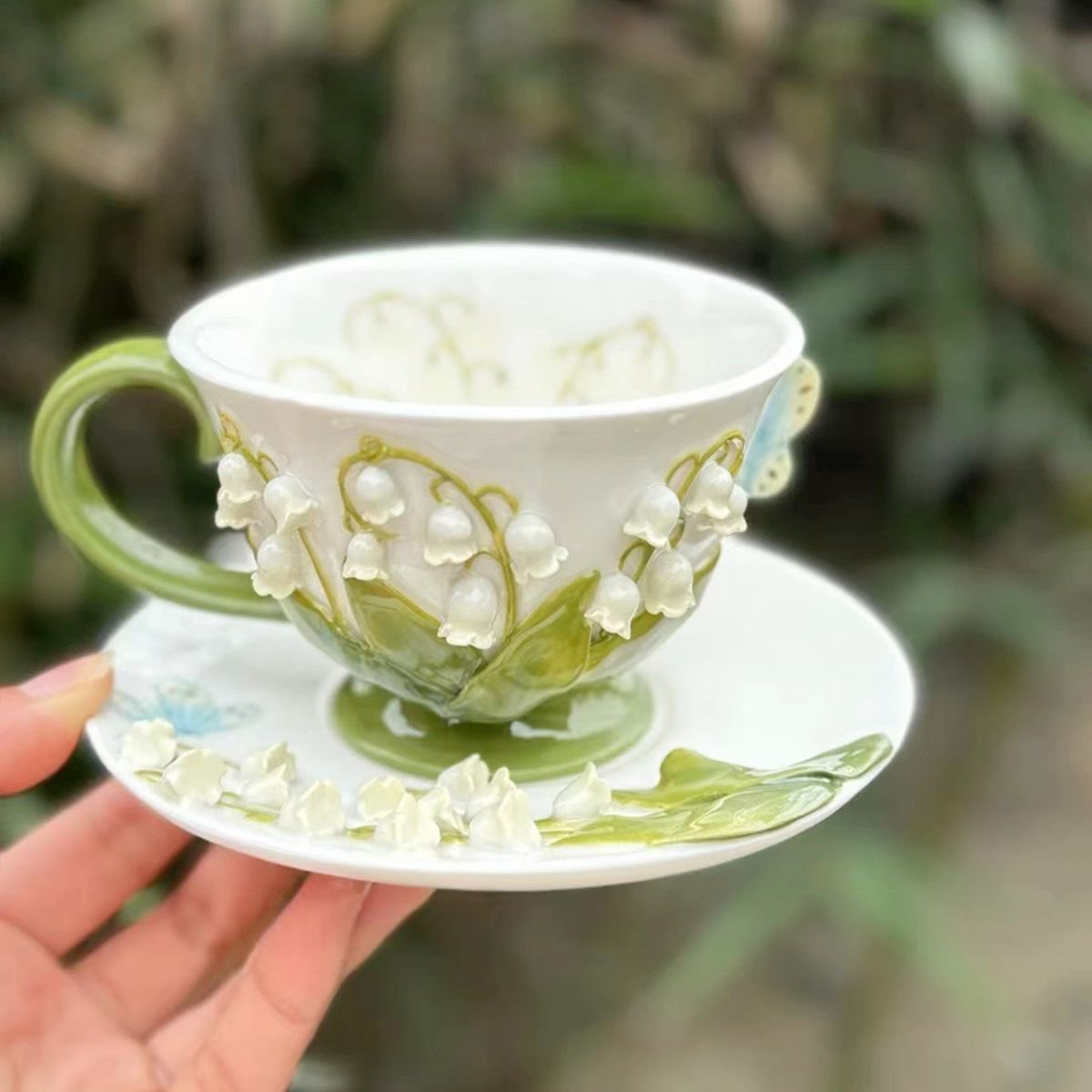 bloomele_'s tweet photo. lily of the valley teapot and cup set https://t.co/K104bMZbw1