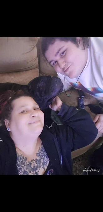 A photo of my friend on the right, her dog in the middle, and her mom on the left.
