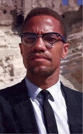 yzycel's tweet photo. Sneako is going through another identity crisis, he’s now larping as Malcolm X 😭 https://t.co/d1QHmAZKnw