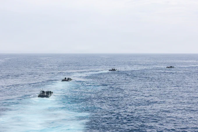 U.S. Marines with 3rd Assault Amphibian Battalion, 1st Marine Division refuel Amphibious Combat Vehicles on the welldeck of Whidbey Island class amphibious dock landing ship USS Ashland (LSD 48) during Quarterly Underway Amphibious Readiness Training 26.4 off the coast of California, July 26, 2026. QUART is a joint training exercise that strengthens amphibious readiness through realistic maritime training, sharpening the warfighting skills of Marines and Sailors to prepare them for crises and to fight west of the International Date Line. (U.S. Marine Corps photo by Lance Cpl. Ronnie Mejia)\n\n