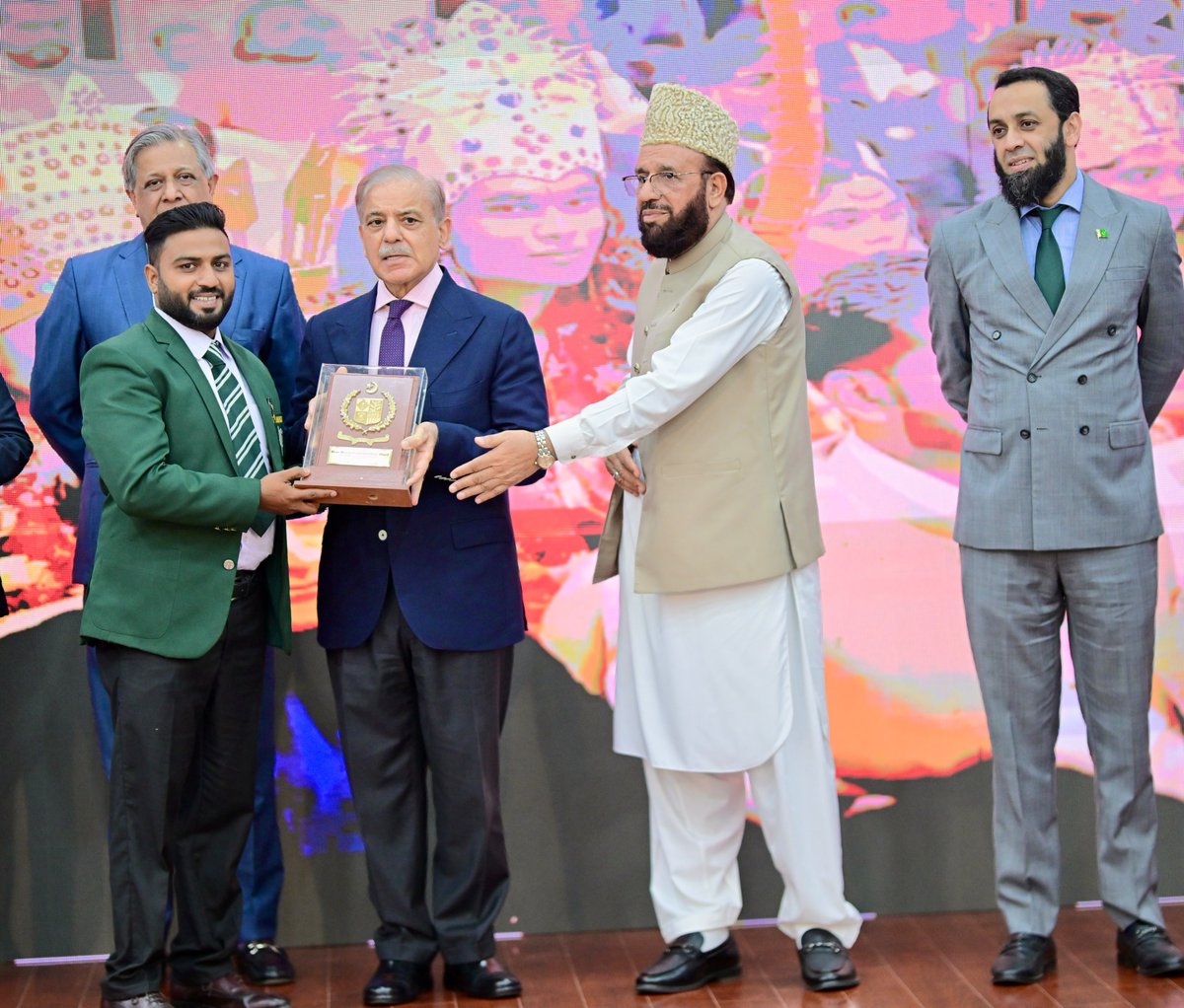 PakPMO's tweet photo. Prime Minister Muhammad Shehbaz Sharif presenting awards to the members of Religious Minorities of Pakistan who contributed  towards the sustained benefits of the society. Islamabad, 11 August 2026. https://t.co/Jt1Zlns84H