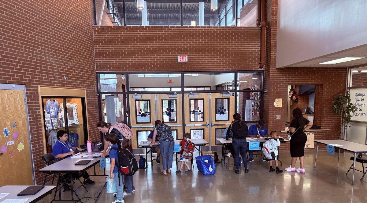 SamDockery's tweet photo. There’s something about a school building in the summer, it’s quiet &amp; almost doesn’t feel like a school.
Then Meet the Teacher happens, &amp; suddenly, CVE comes back to life!
The smiles, laughter, families, &amp; especially our kids reminded me why this job is so special. https://t.co/Htg923Gnpe