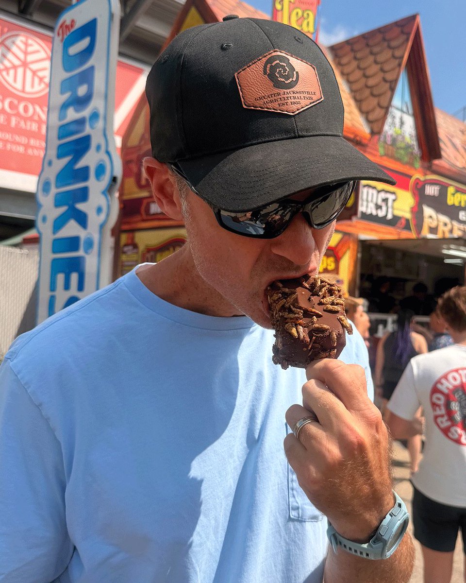 jaxfair's tweet photo. Board Member Charles Bond found a frozen cheesecake covered in ... BUGS... Yep. Bugs. The kind with legs: Frozen Cheesecake on a Stick with a caramel-and-ant center, dipped in chocolate and covered in crickets and worms. Because sprinkles are for quitters. 🦗🐜 #crazydesserts https://t.co/Q8qqoXLYlN