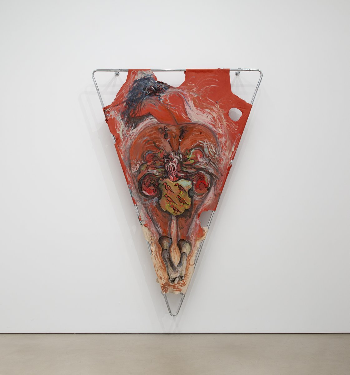 PetzelGallery's tweet photo. In Raphaela Vogel’s new leather works mounted on metal rods, she investigates heraldic symbols whose meanings become fixed through repetition and association with power, and seeks to disrupt these orders through painting, detaching image from predetermined meaning. In this series she draws on the ideas of philosopher Charles Sanders Peirce, who described three types of signs: symbol, icon, and index. The work moves between these three poles—from fixed symbolic meaning, to recognizable imagery, to the trace-like marks of gesture and material action. These relationships can be represented as a triangle, which becomes a conceptual figure of painting itself: a form in which meaning is not fixed but kept in motion. Working on leather further emphasizes this process, as the material itself carries marks, resistance, and history. Additionally, she spotlights a nude female figure, painted after Gustave Courbet’s "L'Origine du monde,” which can also be read as a representation of the female knight the painting is named after, “Lady Nicholaa de la Haye.” 

Artwork: Raphaela Vogel, “Lady Nicholaa de la Haye,” 2026, Oil on leather with metal rods, 99 1/2 x 69 x 9 in, 252.7 x 175.3 x 22.9 cm. 

#raphaelavogel #artist #petzel #mustsee