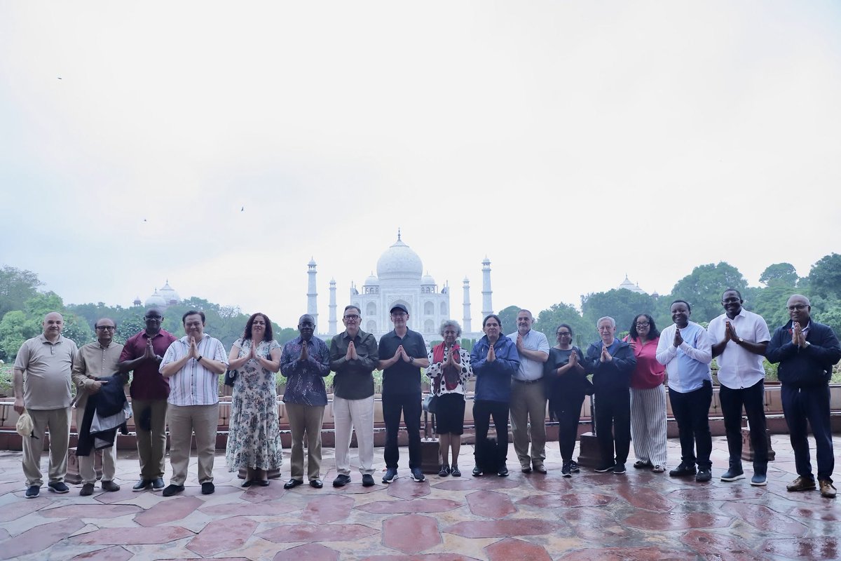 AmbStesfamariam's tweet photo. A week-long study visit to India has left me with incredible memories, new perspectives, new friendships, and a renewed appreciation for the depth and complexity of a country that has so much to share with the world. The visit offered far more than an opportunity to see India. It provided a window into its diplomacy, history, institutions, culture, development experience and, above all, its people.

My colleagues and I, the Permanent Representatives of #Burundi, #CaboVerde, #Chile, #Eritrea, #Fiji, #Guatemala, #GuineaBissau, #Indonesia, #Iraq, #Kenya, #Mauritius, #Nicaragua, #Panama, #Slovakia St. Lucia, St. Vincent and the Grenadines, and #SierraLeone, spent one week together, sharing experiences, perspectives and lots of laughter. 

The opening briefing and dinner set the tone for a week of substantive engagement and exchange. Our interactions with senior Indian officials, including Ambassador Sibi George, Secretary (West), and India’s External Affairs Minister, Dr. S. Jaishankar, provided valuable insights into India’s foreign policy, its development experience, and its growing role in a rapidly changing international environment.

Paying homage to Mahatma Gandhi at Rajghat was particularly meaningful. Gandhi’s legacy transcends India. His ideas on national liberation, peace, non-violence and human dignity continue to resonate far beyond the country in which he lived and led.

The programme also gave us an opportunity to experience India's extraordinary historical and cultural heritage. Places such as Rashtrapati Bhavan and the Chhatrapati Shivaji Maharaj Terminus are reminders that heritage is not simply about magnificent buildings. It is about the history, craftsmanship, creativity and encounters between cultures that those buildings embody. CSMT, for example, reflects a remarkable synthesis of Victorian Gothic and Indian architectural traditions and stands today as a UNESCO World Heritage Site.

There were also some wonderful personal moments.
Meeting #Eritrea’s Ambassador to India, H.E. Alem Woldermariam, was particularly special and oen that I was looking forward to. And then came an unexpected connection: meeting an Indian peacekeeper who had served with the United Nations Mission in Ethiopia and Eritrea (UNMEE). 

Encountering someone in India who had once served in Eritrea was one of those remarkable moments that reminds us how interconnected our histories and experiences can be. But perhaps the most important lesson from the visit was not found in any particular building or monument. It was found in the people...

The visit also reinforced for me the value of South-South cooperation and of countries learning from one another, not by copying models, but by understanding experiences, adapting what is relevant and finding solutions rooted in their own realities.

And then, at the very end of the journey, came the moment that made the week deeply personal.
My parents visited the Taj Mahal in the 1960s.
I grew up with a photograph of them standing there. That photograph became part of my childhood image of India, long before I ever imagined that one day I would have the opportunity to travel there myself. Decades later, I finally stood where they had stood...

The Taj Mahal is, of course, one of the world's most recognizable monuments and a UNESCO World Heritage Site. But for me, it was much more than an extraordinary monument of architecture and history.
It was a connection across generations...

Some journeys take us to places we have never seen.
Others take us back to where our dreams began.

This journey did both.