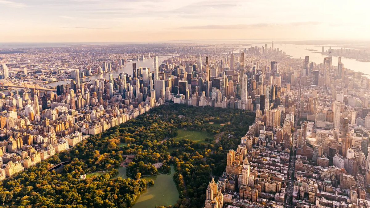 TheOmniLiberal's tweet photo. I went to NYC last month and there were so many huge buildings in Manhatten it was crazy!!! I remember just a couple years ago the entire island was basically empty sand dunes before Mamdani came along, such a blessed and wonderful leader. https://t.co/TK2X7MjGO2