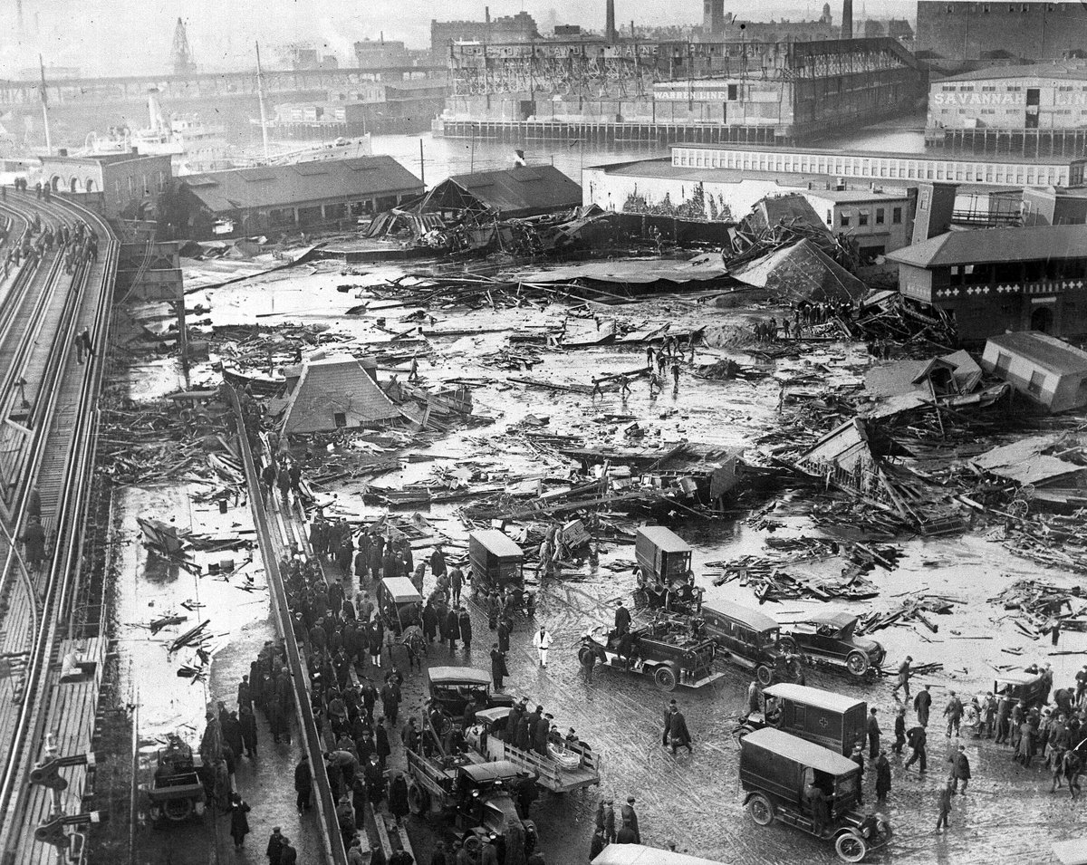 Genesis_Content's tweet photo. 🍯 A CITY ONCE FACED A 15-FOOT-WAVE OF MOLASSES.

It sounds like something from a cartoon.

It wasn't.

On 15 January 1919, a huge storage tank in Boston's North End suddenly ruptured. Inside were approximately 2.3 million gallons of molasses.

Then the impossible happened.

A massive wave of the thick, sticky liquid rushed through the streets at an estimated 35 miles per hour.

The wave:

🏠 Destroyed buildings.
🚂 Damaged elevated railway infrastructure.
🐎 Killed horses.
👥 Swept people away.

By the time the disaster ended:

21 people were dead and about 150 were injured. But why was molasses moving so violently?

Investigations eventually found that the tank itself was dangerously inadequate.

Later scientific analysis also suggested that temperature played a role: relatively warm molasses had been brought into Boston shortly before the tank ruptured, while the January air was much colder.

As the molasses cooled, it became dramatically more viscous.

The disaster led to a major legal battle and helped highlight the importance of proper engineering standards and inspection.

The cleanup was enormous.

Salt water and sand were used to remove the sticky material, but molasses was carried throughout the neighbourhood on shoes, vehicles and rescue equipment.

For weeks, Boston was dealing with the aftermath. A disaster caused by something most people associate with pancakes.

History can be stranger than fiction.

#History #Boston #Engineering #DidYouKnow #GenesisContent