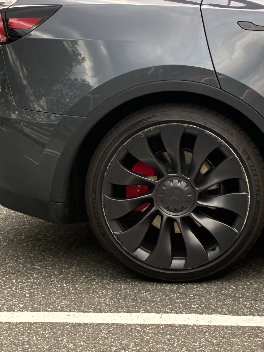BigotedNox's tweet photo. Pull up to a Tesla at the gas station and I see these rims. I think to myself "no way in hell that the stereotype is true". I go inside to get iced coffee. 

There's only two cars here so whomever is inside is the owner.  It's an Asian woman. https://t.co/GaFoeS1Oi2