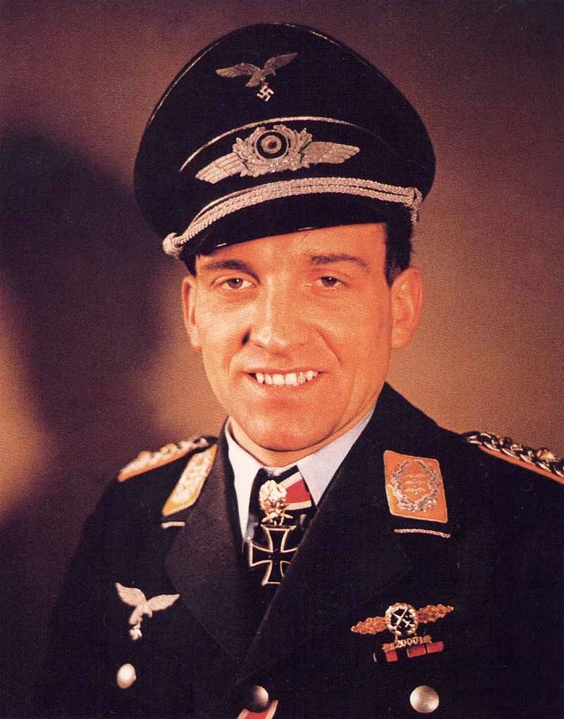 VoicesofWW2's tweet photo. Hans-Ulrich Rudel flew 2,530 combat missions, was shot down more than thirty times, destroyed over 500 tanks from the air, sank a battleship, and became the only man ever to receive the very highest German decoration, a grade of the Knight's Cross created specifically for him because nothing else was high enough. As a ground-attack pilot he is in a category of one.

Rudel flew the Junkers 87, the Stuka, the gull-winged dive bomber with the screaming siren that had terrorized Poland and France early in the war. By the time he was in his prime, the Stuka was considered obsolete, too slow and vulnerable, but Rudel turned it into a precision tank-killing machine on the Eastern Front. He flew a version fitted with two long-barreled cannon under the wings, and he developed an almost unbelievable skill at diving on Soviet tanks and putting armor-piercing rounds through the thin plating on their engine decks, killing them one at a time, over and over, day after day.

His tally is staggering. More than 500 tanks destroyed, the figure usually given is 519, along with hundreds of other vehicles, artillery pieces, armored trains, bridges, and even a handful of aircraft shot down. In 1941 he sank the Soviet battleship Marat in Kronstadt harbor with a direct hit, a single dive bomber putting a bomb into a battleship's magazine. He flew more combat missions than any pilot in history, over 2,500 of them, most on the Eastern Front.

He was also shot down or forced down more than thirty times, wounded repeatedly, and yet kept flying. Late in the war his leg was shattered and had to be amputated below the knee, and he had himself fitted with an artificial leg and went straight back to flying combat missions, destroying tanks with one leg gone. The Soviets hated and feared him so much that Stalin reportedly put a large bounty on his head.

For all this he received the Knight's Cross and then every higher grade of it, and finally a unique decoration, the Knight's Cross with Golden Oak Leaves, Swords, and Diamonds, an award created for him alone, the only one ever given. He survived the war, having flown from the first year of it to nearly the last day, the most decorated German serviceman of the entire conflict, and one of the most successful combat pilots who ever lived by almost any measure you choose.