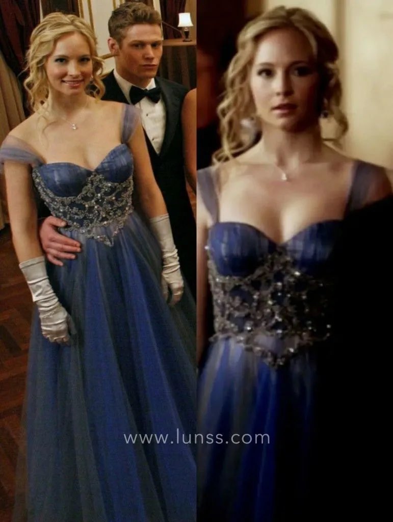 crusader0fchaos's tweet photo. was just reminded that my best piece of lore is that a boy broke my heart right before senior prom and in an effort to make me feel better my mother literally hunted down the dress caroline wears to the mikaelson ball. it worked. boys come and go. dresses are forever. https://t.co/ydnkpTz6t3