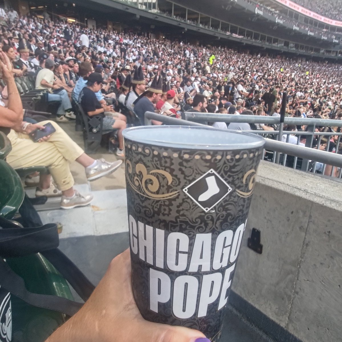 BCB_Sara's tweet photo. Chicago Pope Hat giveaway night is the greatest giveaway night in the history of American sports https://t.co/fhDL8e5Obm