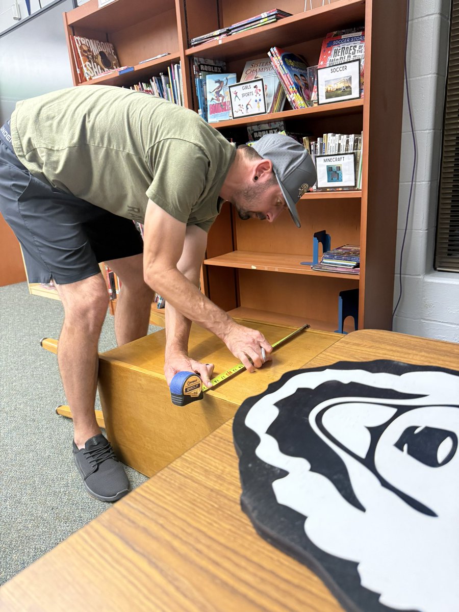 A_MinearAHL's tweet photo. What happens when your logo needs put back on your podium the day before you need to use it? Mr. Dr. Minear comes to the rescue! Shout out to @RoyalPowerSport for helping to make our big day with our #CPSbest #TrustyHuskies a little better! https://t.co/kKy1PcWH99