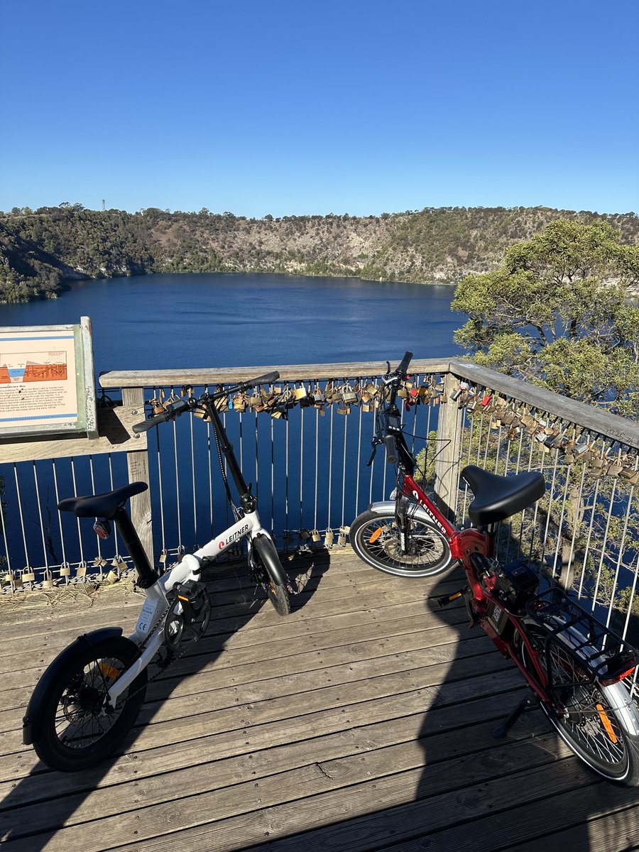 LeitnerDirect's tweet photo. Priya and Sid's SuperT and Aria folding eBikes overlooking the pristine Blue Lake at Mt Gambier. What more could you want from a view? Buy your Leitner eBike here: https://t.co/IuIOLOYlZm. #leitnerbikes #leitneronline #ebikes #electricbikes #australia https://t.co/D5wvuNdMHX