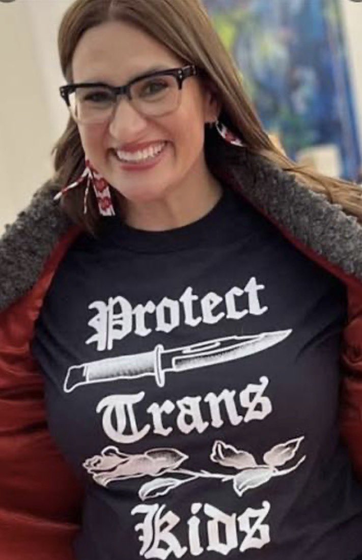 Badhombre's tweet photo. Peggy Flanagan is Minnesota’s Democrat Senate nominee. When she’s not threatening to stab you for not affirming “trans kids,” she’s wearing a hijab to pander to Somali fraudsters. https://t.co/8JWkKt1FHv