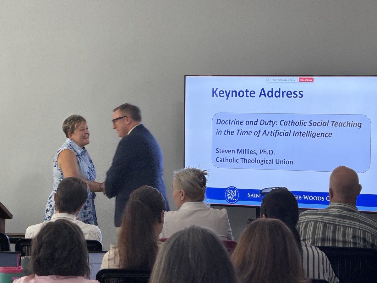 smwc's tweet photo. Janet Clark, Ph.D., provost, introduces the keynote speaker for SMWC’s Faculty Launch. Steven Millies, Ph.D., spoke to faculty about "Catholic Social Teaching in the Time of AI." https://t.co/0demCNS8OO