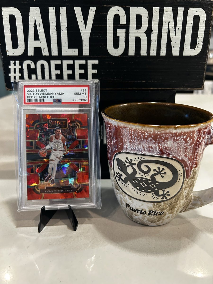 CollectWithKat's tweet photo. Good morning ☀️ 

Let’s keep going strong thru the mid-week madness!

Join us for today’s “A Cup &amp; A Card” featuring the PSA 10 Red Cracked Ice Wemby RC!

This was the first slab I purchased, my first dive into the world of PSA 10s

What was your first slab?

#TheHobby #THFpro https://t.co/SxKLpLlnbc