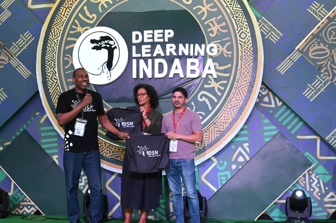 dsn_ai_network's tweet photo. Behind every great gathering are people who choose to serve. Today, we celebrate the people behind #DLI2026.

For six remarkable days in Lagos, Nigeria became a meeting point for Africa's AI community as the 8th annual Deep Learning Indaba (@DeepIndaba)  convened 1,000+ engineers, researchers, practitioners and policymakers from 45 countries at Pan-Atlantic University (@pau_nigeria).

Behind that scale, energy and experience was something even more important: people.

People who gave their time. 
People who carried responsibility. 
People who worked through countless details behind the scenes. 

People who believed deeply enough in the vision of African AI to make it happen.

At the closing of Deep Learning Indaba (@DeepIndaba)  2026, our Founder, Dr. Olubayo Adekanmbi (@bayoadekanmbi), took a special moment to recognise some of those remarkable individuals.

We celebrated the Indaba Operations Committee, including Emily Muller  and Avishkar Bhoopchand, for the dedication, selflessness and enormous work required to turn the vision for this year's Indaba into six days of learning, research, collaboration and community.

We also celebrated the three General Chairs of #DLI2026 — Aisha Alaagib (@AishaAlaagib), Albert Njoroge Kahira  and DSN's own Director, AI Solutions Delivery, Chinazo Anebelundu (@rKyrian) — whose leadership helped steer the Indaba's journey to Nigeria and bring together a truly pan-African gathering.

Hosting more than 1,000 members of the AI community from 45 countries is no small undertaking. Beyond the numbers were hundreds of conversations, research exchanges, workshops, tutorials, community sessions and new relationships — all contributing to a much bigger ambition: ensuring that Africa is not simply participating in the future of AI, but actively shaping it.

As a small expression of our appreciation, DSN (@dsn_ai_network) presented special gifts to the Indaba leadership.

The gifts themselves were symbolic. The real message was much simpler: We see the work. We recognise the sacrifice. And we are grateful.

At DSN (@dsn_ai_network), we have learnt over almost a decade of community building that institutions may provide platforms, but people build movements. Deep Learning Indaba (@DeepIndaba) continues to demonstrate what becomes possible when talented people from across the continent choose to give back, collaborate and build something larger than themselves.

To the General Chairs, the Operations Committee, the wider organising team, volunteers, speakers, partners and everyone who worked behind the scenes to deliver #DLI2026:

Thank you for showing up. 
Thank you for giving your time. 
Thank you for serving Africa's AI community. 
And thank you for making Nigeria 2026 a moment to remember.

The gathering may have ended, but the relationships, ideas and collaborations it created are only beginning.

Onward, together, as we continue building Africa's AI future.

#DLI2026 #DeepLearningIndaba #Indaba2026 #AfricanAI #DataScienceNigeria #AIinAfrica #Community #Nigeria