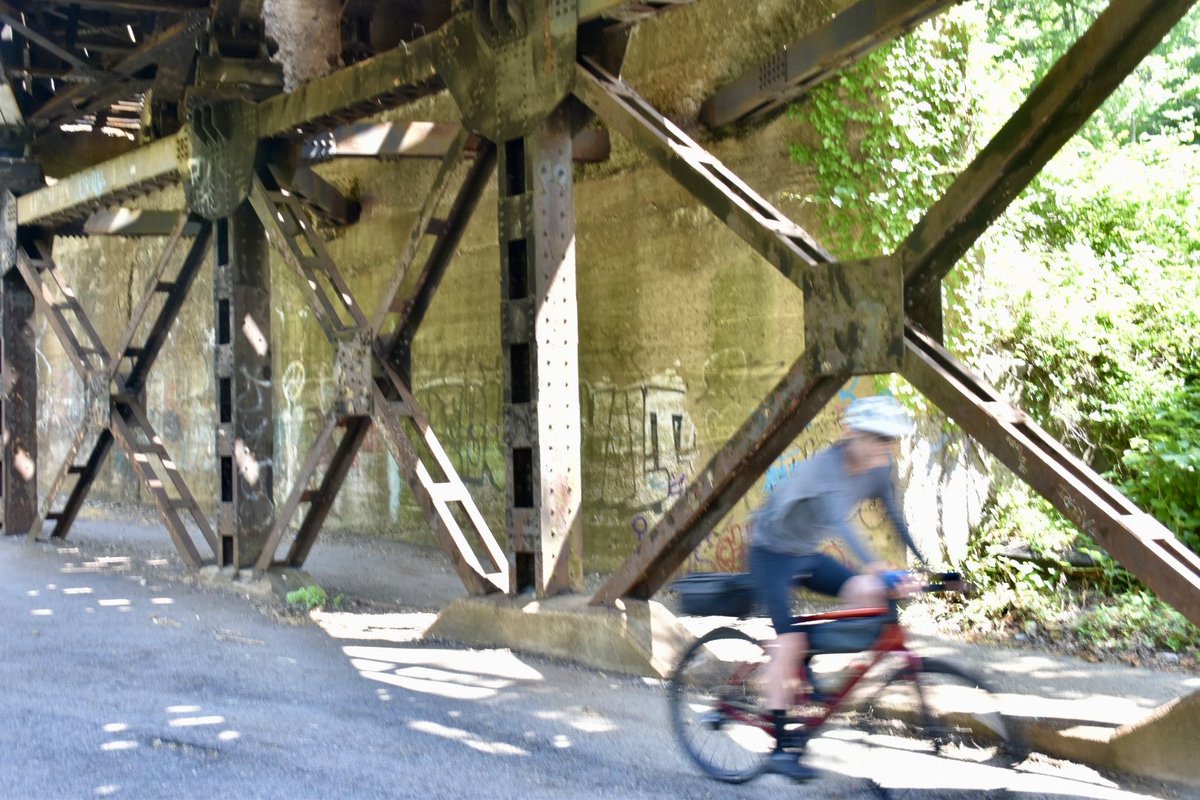 RuslakWalter's tweet photo. @DailyPicTheme2 #Action - a biker zips under a bridge. https://t.co/RCjrHjZMzo