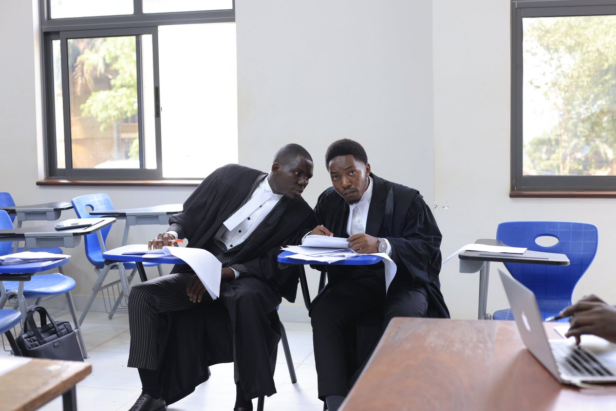 MakerereLaw's tweet photo. Preliminary rounds of the Inaugural Digital Health Moot Court Competition are happening today with finals to be held tomorrow.

The hypothetical case under consideration is: In the High Court of Ngalamba, Gracious Asiimwe Versus 1. Winner Insurance Company 2. The Attorney General of Ngalamba

The case is about a woman named Gracious Asiimwe who lives in Ngalamba, a country that is trying to modernize its health system by using computers and digital records. The government and a big insurance company (Winner Insurance) started a program to put everyone's health information into a digital health system, hoping it would make healthcare better and more efficient.

 Asiimwe is suing the insurance company and the government arguing that they did not protect her privacy, did not ask for her permission to use her health information, and made it harder for her to get the care she needed. 

The plaintiff side is highlighting a number of issues arising from introduction of the new system:
- Private and sensitive medical information was not kept safe.
- People's health data was sent to other countries and used by private      companies without asking for permission.
- The new digital system made it harder for some people to get care. That, patients had to repeat expensive medical tests because different hospitals' computer systems couldn't talk to each other.
-The government took money away from hospitals and schools to pay for  the new digital system, making it harder for people to get basic services.