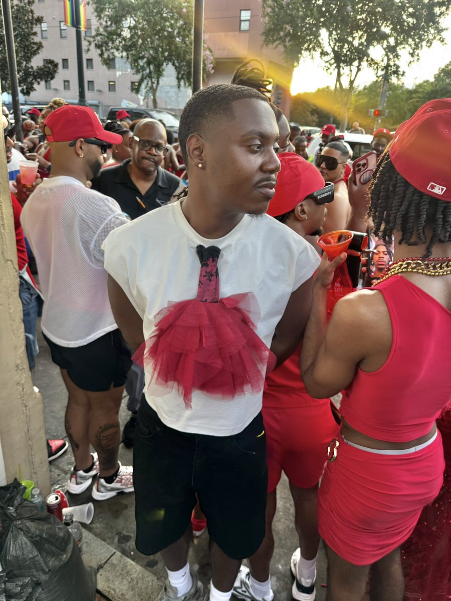 SheanMeetsWorld's tweet photo. How yall like my #RedDress ? Technically I am wearing a dress so I was still in theme lol. The people loved my #creativity #NolaReddressrun2026 #reddressrun https://t.co/hSULYneulQ