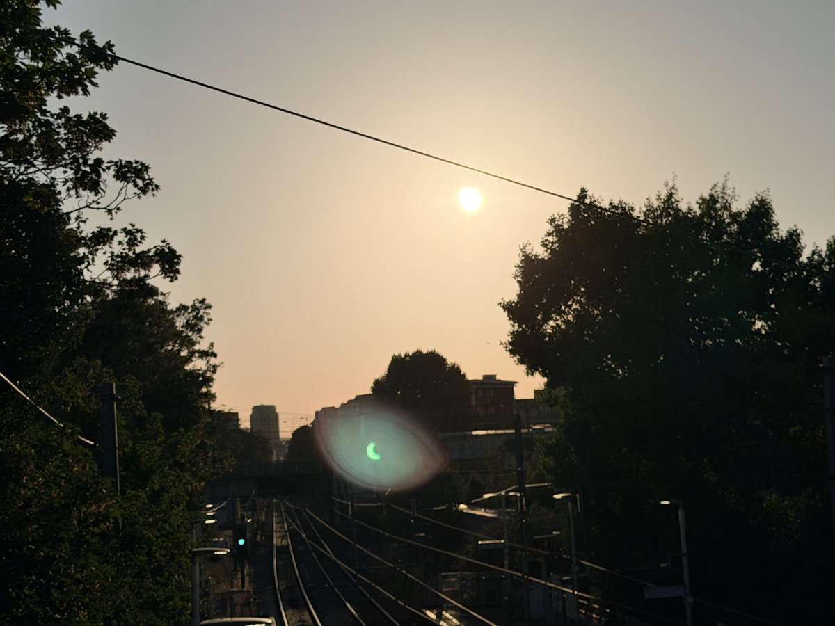 rtruscott's tweet photo. My #PartialEclipse journey home earlier this evening, from our satellite office in Broadwater Farm before 7 (photo no. 1), via Bruce Grove Station, Hackney Central (2), Caledonian Road & Barnsbury (3) & Barnard Park (4) as the #Eclipse ended & the sun set! https://t.co/o9y78DW1zB