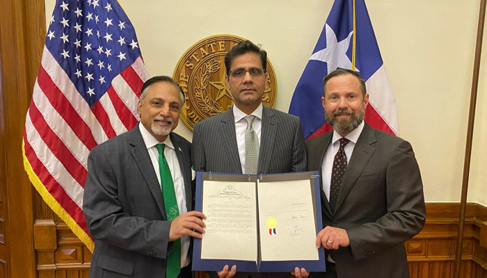 AmyMek's tweet photo. 🚨THE PLOT THICKENS IN PAKISTANIFIED TEXAS! 

Republican Constable, Pakistani Consul General, and the Speaker Who Made It Official

Notice who appears in the videos with Fort Bend County Precinct 3 Constable Ali Sheikhani.

Born in Pakistan. Arrived in America on a student visa. Graduated the police academy in 2019. Did only brief part-time policing. Then, as a multi-millionaire businessman who rolls into work in a Rolls-Royce, he ran as a Republican and won control of a Texas law enforcement office.

Standing right next to him in those videos is Muhammad Aftab Chaudhry - Pakistan’s Consul General in Texas.

Remember last year when we broke the story?

The Texas House of Representatives passed a resolution officially recognizing March 23 as “Pakistan Day.”

🚨Standing side-by-side for the photo-op:

🔺Democrat State Representative Dr. Suleman Lalani (the one who introduced it)

🔺Pakistan’s Consul General Muhammad Aftab Chaudhry

🔺Republican House Speaker Dustin Burrows - WHY!?

This was not a fringe Democrat stunt.

It was bipartisan. Did you HEAR THAT, TEXAS!? 

Republican leadership worked hand-in-glove with a Democrat and the Pakistani diplomatic corps to push it through.

Now look at the full picture:

You have this wealthy Pakistani immigrant - now a Republican constable who throws cash around in his radical homeland like a strip-club high roller, welcomes Pakistani officials into a Fort Bend police station, runs job fairs packed with South Asian faces, and owns Sheikhani Plaza full of Pakistani businesses - standing shoulder-to-shoulder with the same Consul General.

Then you have Republican Speaker Dustin Burrows sitting down with that same Consul General, accepting praise and an invitation to visit Pakistan, while Democrat Lalani hosts the iftar dinner at the Capitol.

This is Pakistanification at every level.

Republican ballot.

Democrat resolution.

Pakistani Consul General in the middle.

Law enforcement.

The Texas House.

The Speaker’s office.

The level of Pakistani influence in Texas politics is not subtle-  it’s institutionalized.

And the Republican Party is drowning in it.