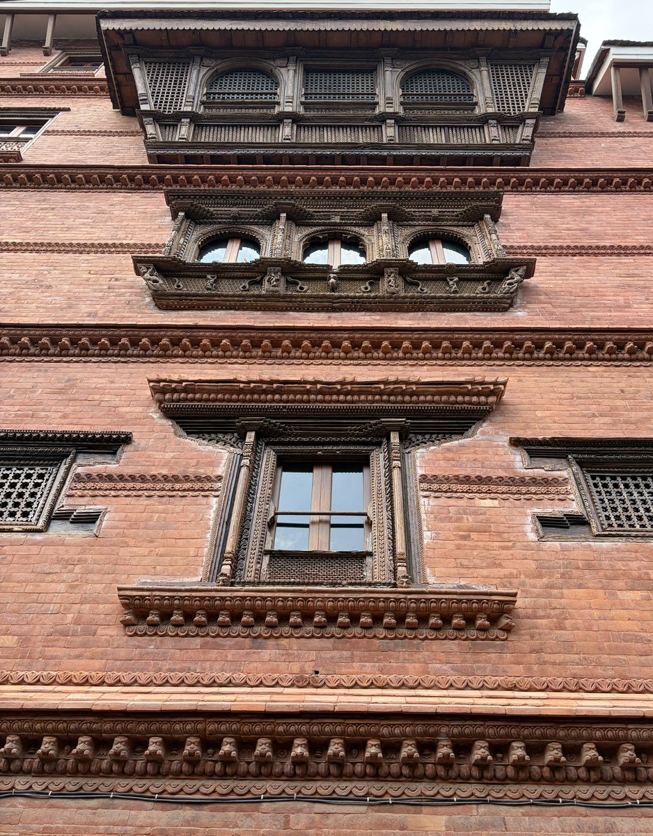 DamonZumbroegel's tweet photo. Is a street full of Facades enough?  -  What makes good design? 
I’m an architect, and was just working in Nepal for a few months. The new architecture of Nepal is sooooo bad, concrete post and beam and infill.  I went to Patan (oldest part of Kathmandu, and nucleus of the Nepali style) for a week, and saw something amazing…….they were making people put classic facades on the horrible concrete structures!  It is lovely, and I appreciated it.  But then I started to think…..”is this just Disneyland?”  A Hollywood set?  Facades on shitty buildings?  Yes it is.  It looks pretty, but behind the facade is still shit!  The design has to go all the way through, not just be make up.  Old Nepal architecture was made for life, in the interiors and exteriors.
