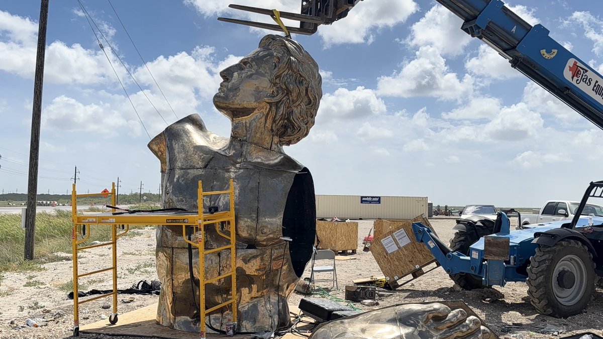 956Mars_'s tweet photo. Just visited the Prometheus statue build at Starbase. Fifty foot Greek Titan rising next to Starships, fire stealing legend meets Mars rockets. French sculptors from Atelier Missor are legends.Epic tribute to human progress. Who’s coming to see this? #Starbase #SpaceX #Prometheus #956MARS
