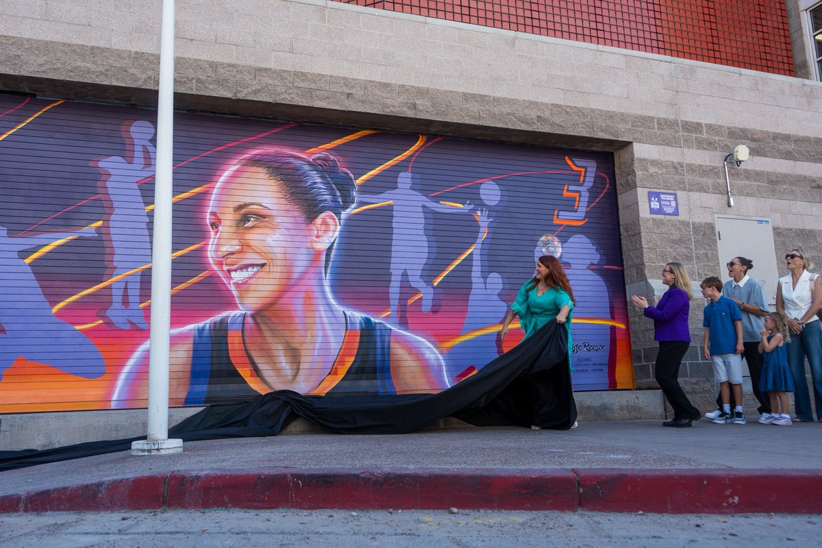MayorGallego's tweet photo. When @DianaTaurasi set the @WNBA scoring record in 2017, Phoenix put up a street sign in her honor.

But she kept scoring, and that number kept growing.

So this morning, we unveiled a new sign with her updated point total and an incredible new mural in her honor at @MMCenter_PHX. A fitting tribute for the GOAT. 🐐🏀