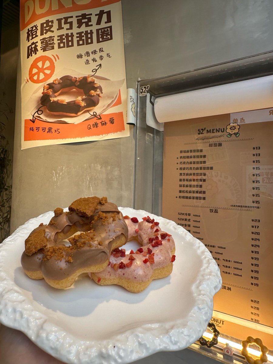 AtandaSodiq5's tweet photo. Just stole the last matcha mochi donut from the café display—warm, chewy, and totally worth the immediate sugar rush https://t.co/vD04U5vFzy