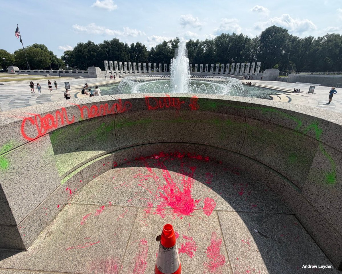 FoxNews's tweet photo. WWII MEMORIAL DEFACED: Bright pink spray paint reading “Clean hands, dirty money” was found scrawled across the hallowed National Mall memorial on Thursday.

The memorial's fountain was also tampered with, overflowing with bubbles, prompting U.S. Park Police to block off the area as they investigated.

The Interior Department condemned the action:

“The World War II Memorial is a sacred place to honor the service of our members of the Armed Forces and the over 400,000 Americans who gave the ultimate sacrifice in WWII. The vandalism that occurred is an utter disgrace and will not be tolerated.”