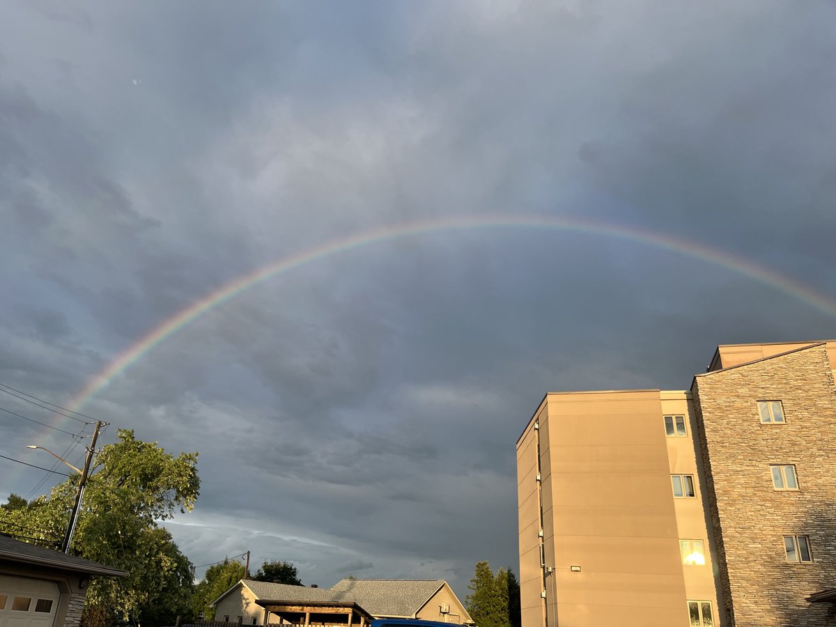lorikeepitreal's tweet photo. Rainbow over the lake at the condo https://t.co/YL4kSHIkvE