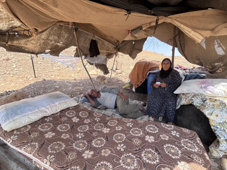 academic_la's tweet photo. The people of this village are now homeless, sleeping in tents in the blistering heat of the Jordan Valley (often around 110 degrees). Their home, shelters, cattle pen and water tank was destroyed by settlers with a bulldozer. Meanwhile, the water they use was fenced off by settlers. They have nothing left.