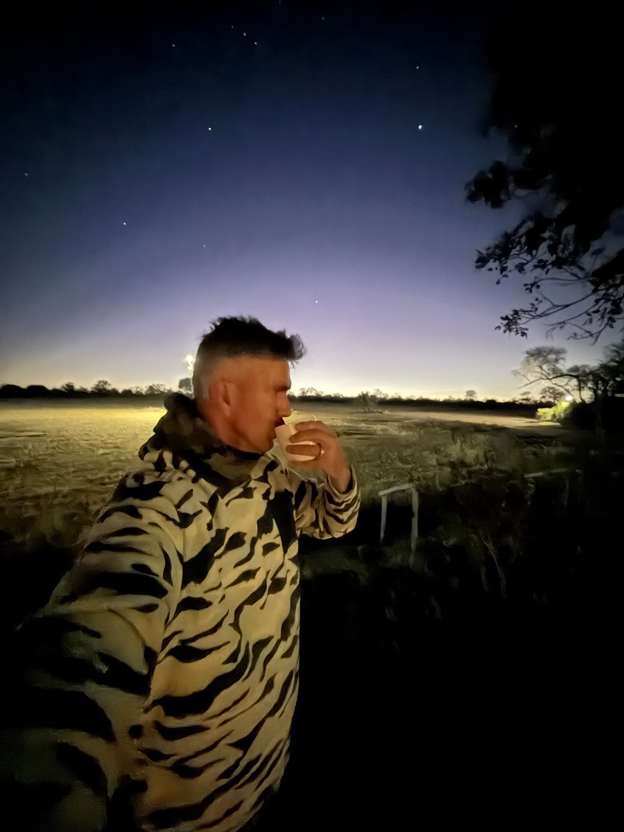 KP24's tweet photo. My coffee and I at 0530 am. 
I wake up every morning in the bush at the crack of dawn to watch the bush come alive  there isn’t a better time in the day, in the bush. https://t.co/FS9SMRe4tf