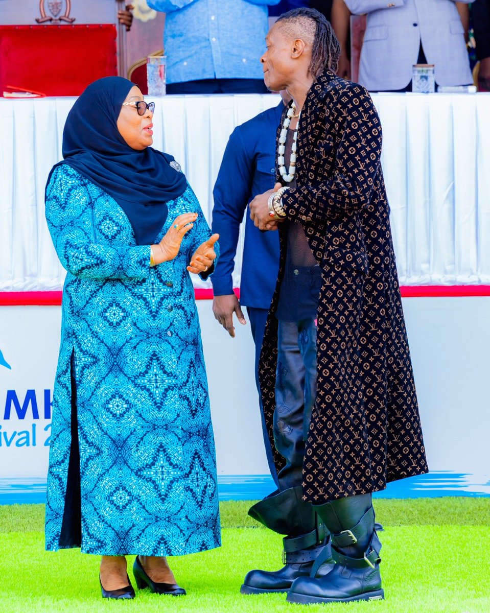 urtupdates's tweet photo. Renowned Ugandan musician @JChameleone was given a special opportunity to take a photo with the President of the United Republic of Tanzania, H.E. Dr. @SuluhuSamia , during the closing and climax of the Kizimkazi Festival 2026, held at Mwehe Grounds in Makunduchi, Zanzibar. https://t.co/1QuMwpaLFE