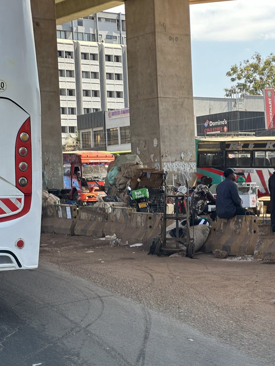 Alfayaz11's tweet photo. The usual Westlands roundabout, the epitome of filth and stench. The burst sewer is simply adding to the already unbearable smell of urine, garbage and general filth. This roundabout has somehow become a celebrated site, almost a crown jewel of our city. It serves as a boda boda stage, a storage yard, a market and, of course, an open air toilet. Truly multifunctional urban planning at its finest, courtesy of our Denzel. INaWork. 

To the defenders of public urination, littering and filth, please feel free to do your thing. This is clearly your comfort zone.

#ReclaimNairobi