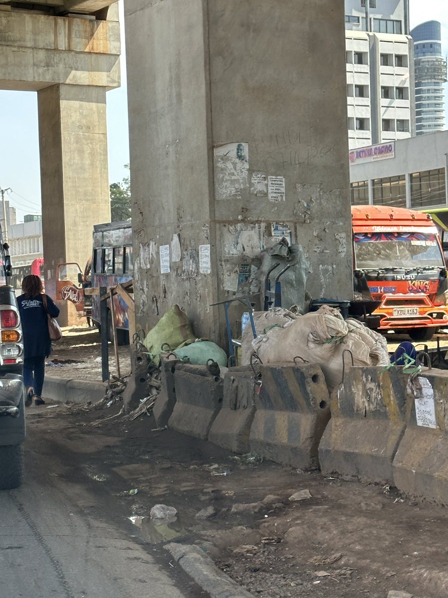 Alfayaz11's tweet photo. The usual Westlands roundabout, the epitome of filth and stench. The burst sewer is simply adding to the already unbearable smell of urine, garbage and general filth. This roundabout has somehow become a celebrated site, almost a crown jewel of our city. It serves as a boda boda stage, a storage yard, a market and, of course, an open air toilet. Truly multifunctional urban planning at its finest, courtesy of our Denzel. INaWork. 

To the defenders of public urination, littering and filth, please feel free to do your thing. This is clearly your comfort zone.

#ReclaimNairobi