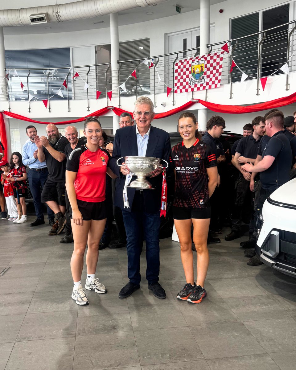 kearysmotors's tweet photo. 🏆 Huge day at Kearys! All-Ireland champions Saoirse McCarthy and Cork captain Méabh Cahalane brought the O'Duffy Cup through our doors. 

Saoirse's one of our own on the Kearys Marketing Team, and seeing her lift that cup means everything. Up Cork! 🔴⚪ https://t.co/ckFyquRhDC