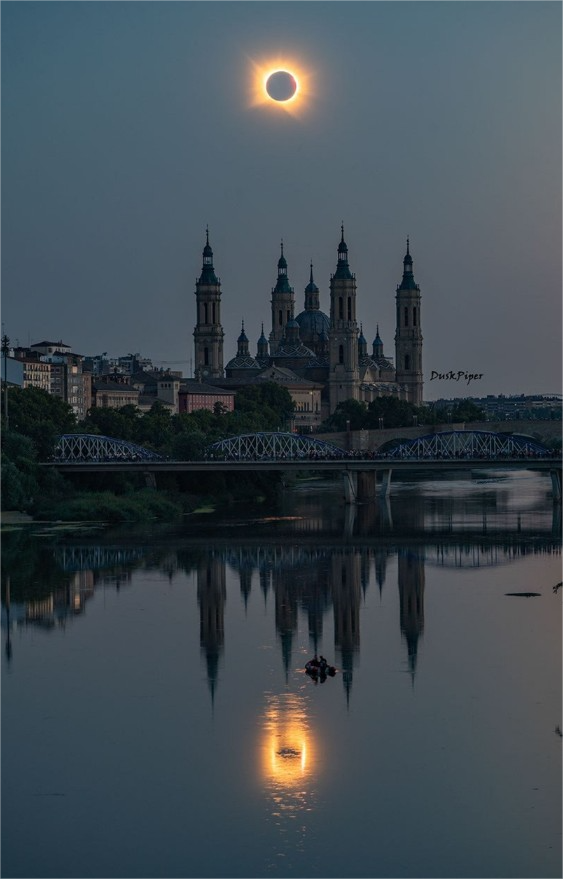 forallcurious's tweet photo. NASA has selected today as the "photo of the day" the one of Zaragoza with two eclipses: the one in the sky and the one reflected in the Ebro River. https://t.co/aW0BAK5ekS