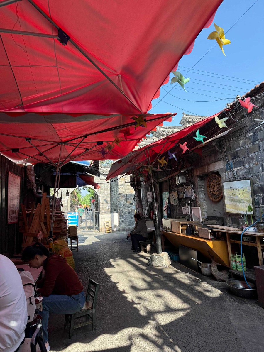 john7raymond's tweet photo. Just caught this golden hour glow hitting old shopfronts on a side street—urban warmth hits different https://t.co/4eAABwQCa2