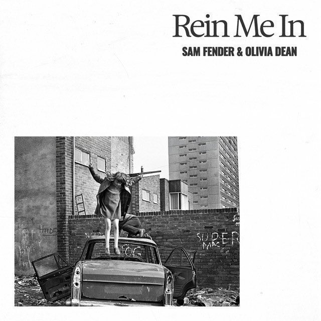 PopCrave's tweet photo. “Rein Me In” by Sam Fender &amp; Olivia Dean spends a 21st week at #1 in the UK.

It’s the longest-running #1 hit in history. https://t.co/pZA0u7jzHh