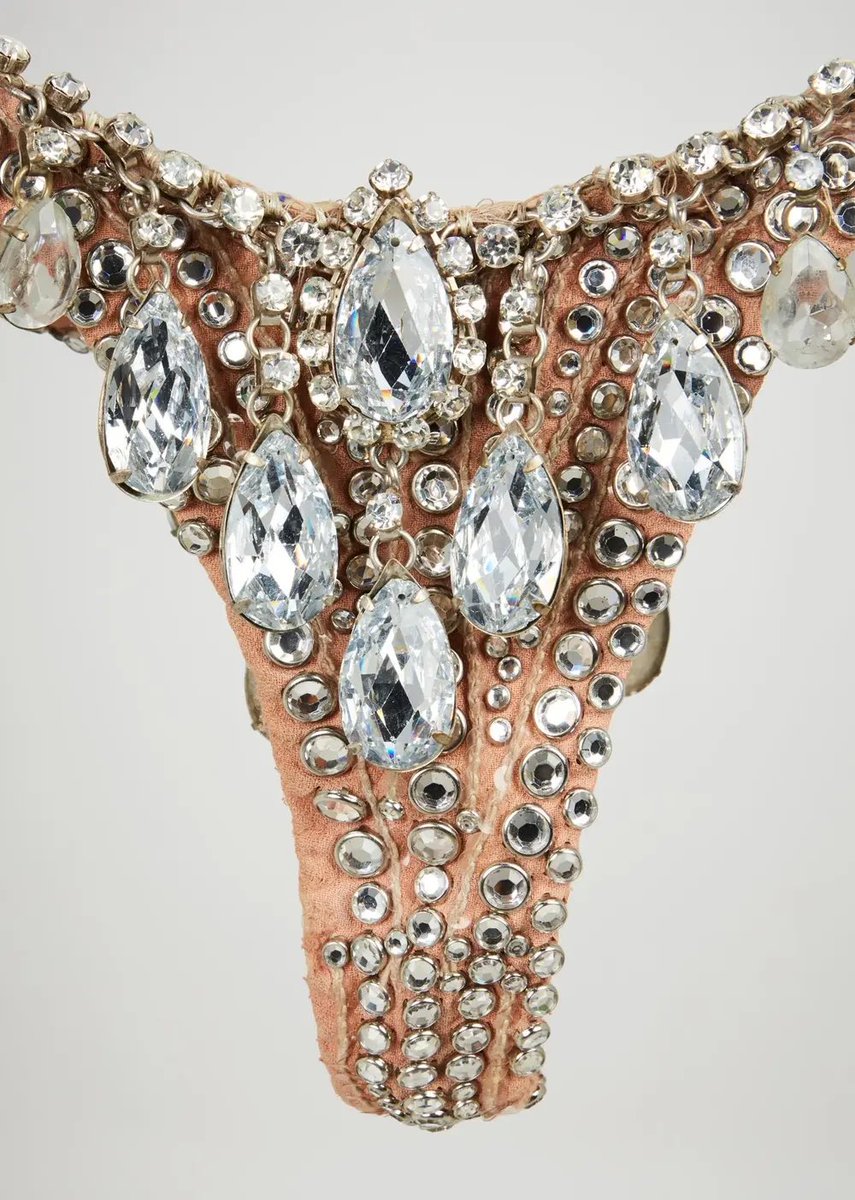 lohanisgod's tweet photo. britney spears wearing a $1 million diamond victoria’s secret bra designed by bob mackie.

the entire set worn by britney spears was later auctioned off for $1.8 million. https://t.co/CoCYZcNy4D