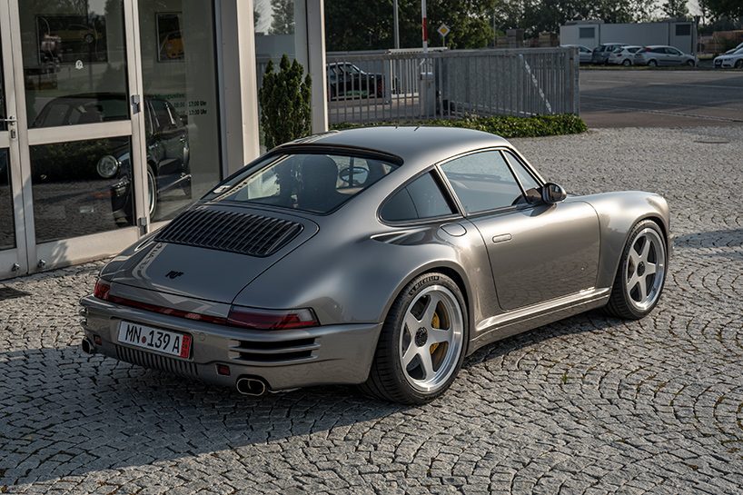designboom's tweet photo. RUF’s first GT arrives in monterey with liquid silver bodywork and seven-speed manual ☁️ https://t.co/kvOFl4BKWY https://t.co/2AbKYl40kh