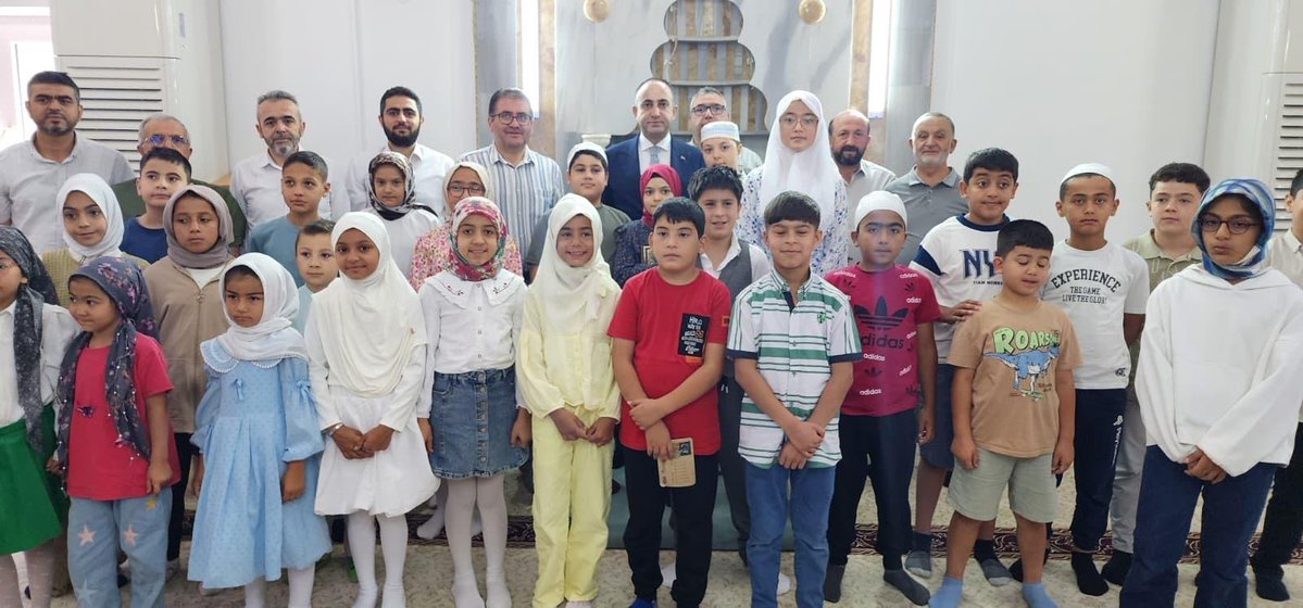 tcmucur's tweet photo. İlçe Müftülüğüne bağlı Hicret Camii’nde düzenlenen 2026 Yılı Yaz Kur’an Kursları Kapanış Programına, Kaymakamımız Sayın Abdullah YÜKSEL, İlçe Müftüsü Sayın Fevzi HÖÇÜK, Şube Müdürü Sayın  Cuma Ali YILMAZ, İlçe Müftülüğü Vaizi Sayın Musa ÇEMBERLİTAŞ, din görevlileri, https://t.co/ax8ec83GAC