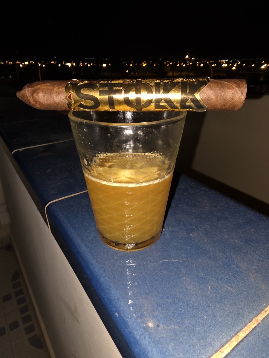 CaskAndAsh's tweet photo. Trying out the new @caocigars STOKK tonight. With an orange and rum sour https://t.co/Y27psAE6Jy