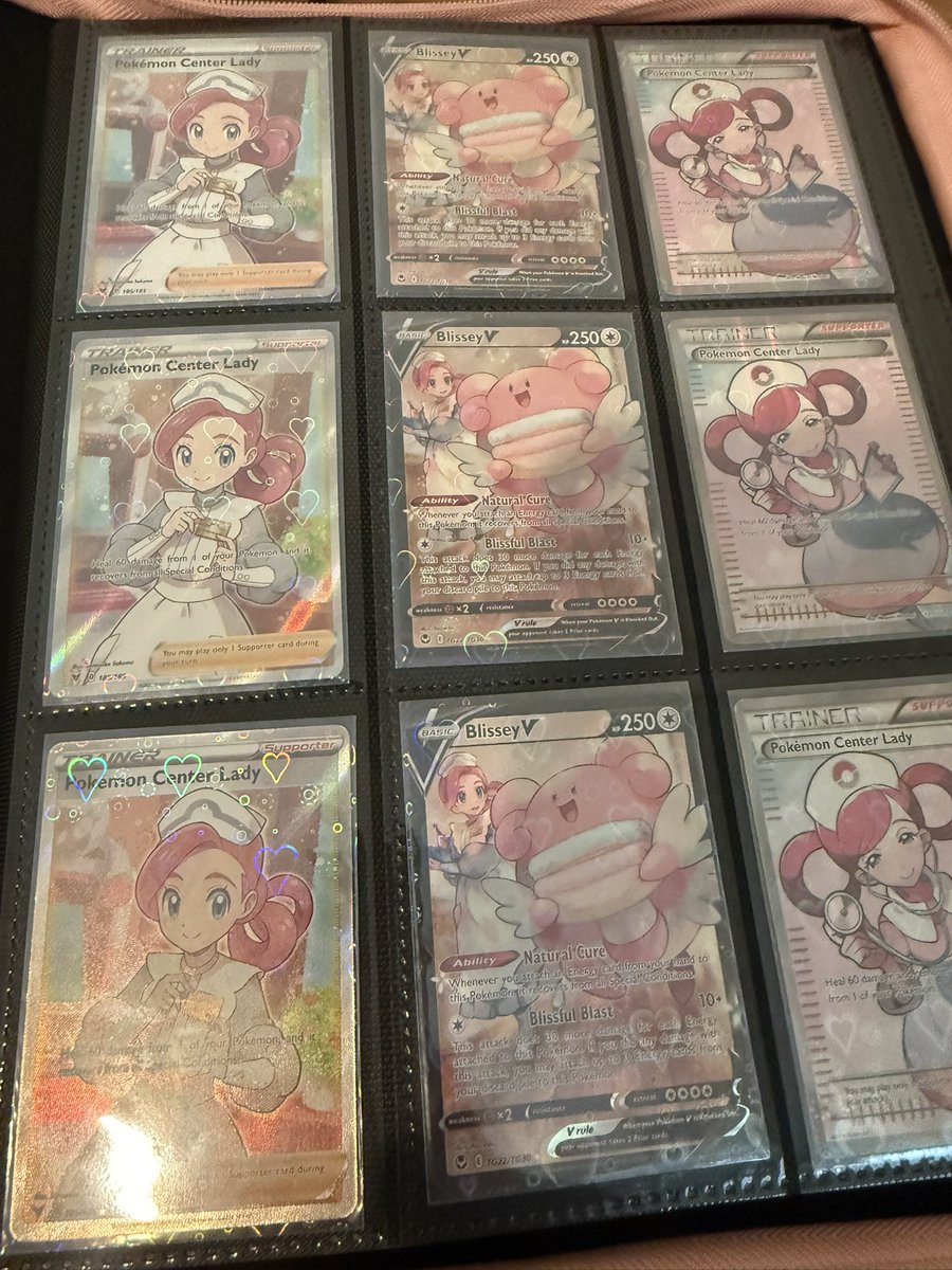 FlorkOfCows's tweet photo. I started a fun project a few months back at collecting Pokémon center lady cards, I’m am still am! I was looking for someone to engrave binders and I just could not find something reasonable so I said fuck it I’ll do it myself. I had some lovely art made up by @BlaireVT and made it myself