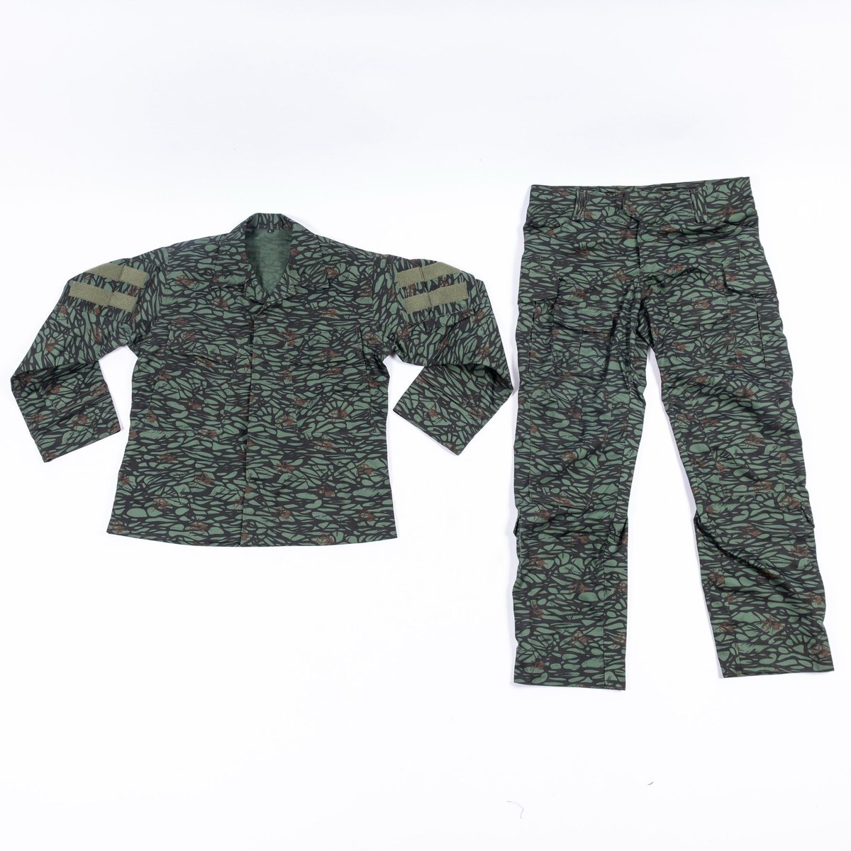 KruschikiSupply's tweet photo. KSC Mozart Combat Uniforms available now

What is this strange camo? 

It is the Ivory Coast’s Ministry of Forests and Water Camouflage. While it was originally fielded by them, the uniforms soon made their way into the hands of troops trained by Russian Mercenaries in Africa, particularly the C.A.R. 

After literal years of searching, we were able to find a bolt of this fabric, and were able to make 14 combat shirts and 14 pairs of pants. These are an upgraded, modern cut- since the original camo uniforms occasionally pop up on the market, we didn’t want to clone something still obtainable, so we decided to have some fun with it. Obviously, this whole project is non political, and was only done due to the uniqueness of the color and pattern.