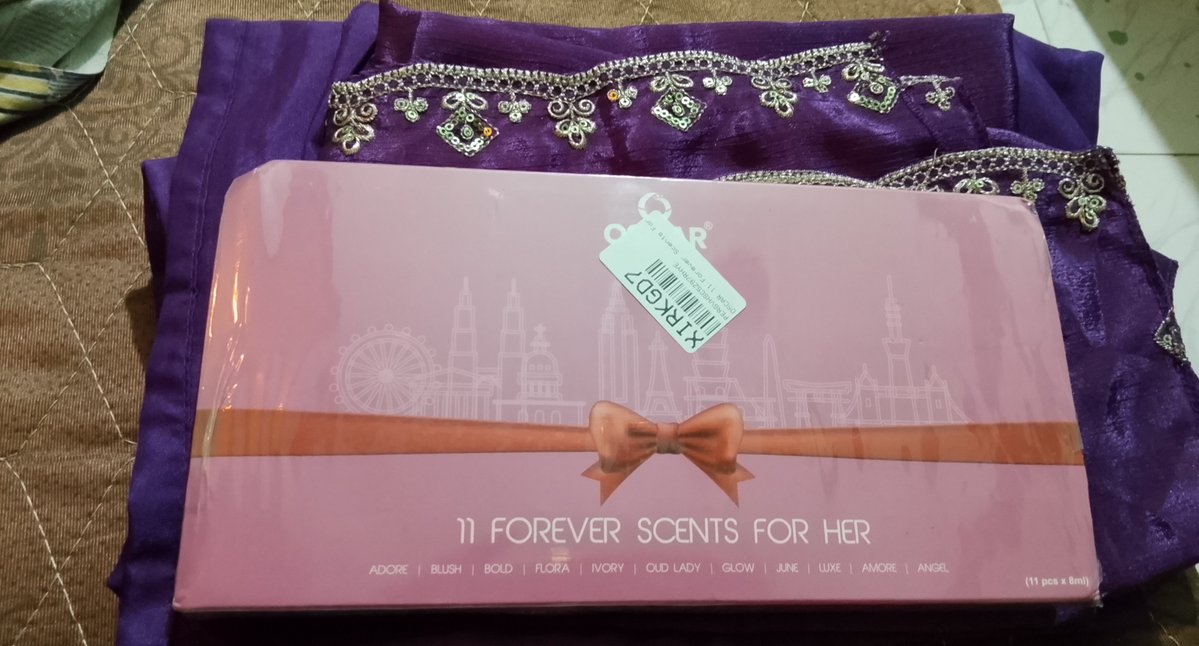 prasannavad12's tweet photo. My friend gifted me this beautiful purple dress and scents. 

Really loved the gift 💜✨ https://t.co/JTnMjB400M