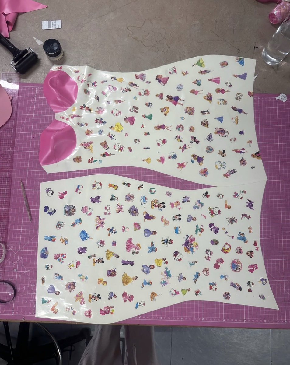 LegendaryLade's tweet photo. Natasha Somerville, Co-Designer of Poster Girl’s custom latex sticker dress ft. 250 individually applied stickers!🔥

It’s 1of 1 and not for sale! https://t.co/fANIucdLvG